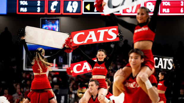 Cincinnati Bearcats cheerleaders perform in the second half of the NCAA basketball game between Cincinnati Bearcats and Oklahoma Sooners at Fifth Third Arena in Cincinnati on Saturday, Jan. 20, 2024.  