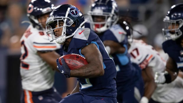 Tennessee Titans wide receiver Cameron Batson (13) races up the field with a catch past Chicago Bears defenders during an NFL Preseason game at Nissan Stadium Saturday, Aug. 28, 2021 in Nashville, Tenn. Nas Titans Bears 032  