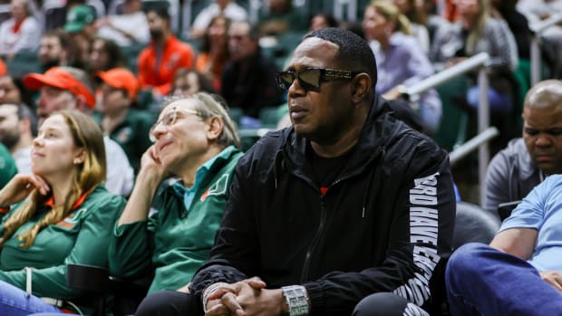 Jan 10, 2024; Coral Gables, Florida, USA; American rapper Master P attends the game between the Miami Hurricanes and Louisville Cardinals at Watsco Center.