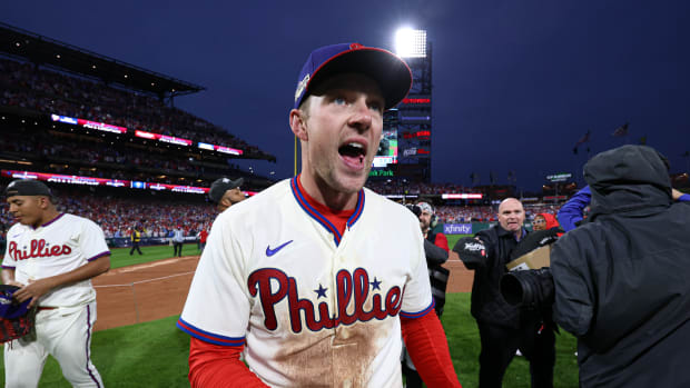 Oct 23, 2022; Philadelphia, Pennsylvania, USA; Philadelphia Phillies first baseman Rhys Hoskins (17) celebrates a win over the San Diego Padres to win the National League Pennant in game five of the NLCS for the 2022 MLB Playoffs at Citizens Bank Park.