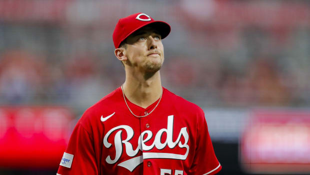 Aug 19, 2023; Cincinnati, Ohio, USA; Cincinnati Reds starting pitcher Brandon Williamson (55) walks off the field during a pitching change in the sixth inning against the Toronto Blue Jays at Great American Ball Park. Mandatory Credit: Katie Stratman-USA TODAY Sports 