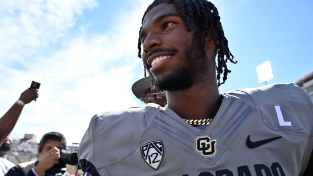 Sep 30, 2023; Boulder, Colorado, USA; Colorado Buffaloes quarterback Shedeur Sanders (2) smiles as he walks off the field after the game against the USC Trojans at Folsom Field
