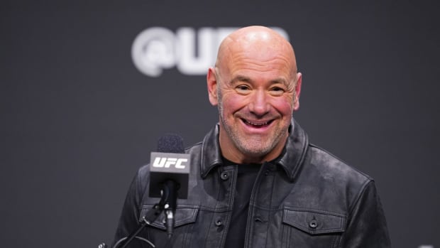 Dana White enjoys a laugh during a UFC press conference.