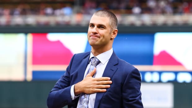 Jun 15, 2019; Minneapolis, MN, USA; Minnesota Twins player Joe Mauer former acknowledges the crowd during Mauer's number retirement ceremony before the start of a game against the Kansas City Royals at Target Field.