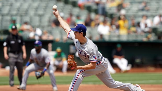 Aug 7, 2021; Oakland, California, USA; Texas Rangers starting pitcher Drew Anderson (58) throws a pitch during the second inning against the Oakland Athletics at RingCentral Coliseum.