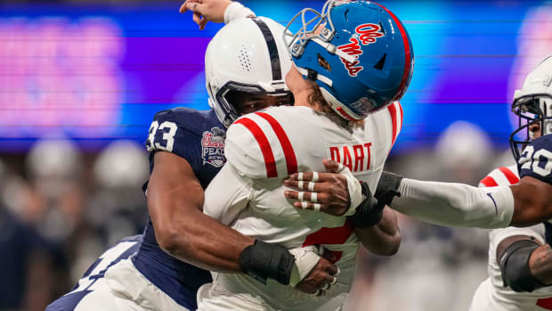 Penn State defensive end Dani Dennis-Sutton hits Ole Miss quarterback Jaxson Dart in the 2023 Peach Bowl.