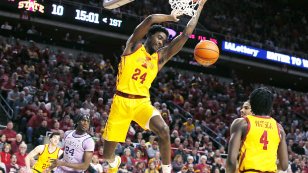 Iowa State Cyclones forward Hason Ward (24) dunks the ball around Kansas State Wildcats forward Arthur Kaluma (24)during the first half in the Big-12 conference showdown of an NCAA college basketball at Hilton Coliseum on Wednesday, Jan. 24, 2024, in Ames, Iowa.  