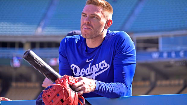 Oct 6, 2023; Los Angeles, CA, USA; Los Angeles Dodgers first baseman Freddie Freeman (5) leans on a rail as he takes a break during NLDS workouts at Dodgers Stadium.