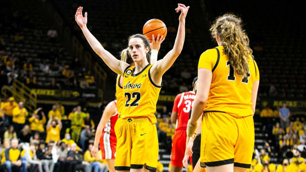 Iowa guard Caitlin Clark (22) pumps up the crowd after drawing a foul during a NCAA Big Ten Conference women's basketball game against Ohio State, Monday, Jan. 31, 2022, at Carver-Hawkeye Arena in Iowa City, Iowa