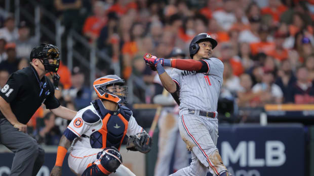 Oct 7, 2023; Houston, Texas, USA; Minnesota Twins second baseman Jorge Polanco (11) hits a three-run home-run in the seventh inning against the Houston Astros during game one of the ALDS for the 2023 MLB playoffs at Minute Maid Park.