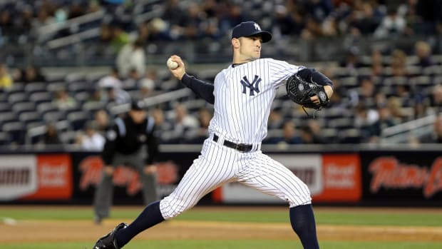 Apr 30, 2013; Bronx, NY, USA; New York Yankees relief pitcher David Robertson (30) delivers a pitch during the eighth inning against the Houston Astros at Yankee Stadium. Yankees won 7-4. 