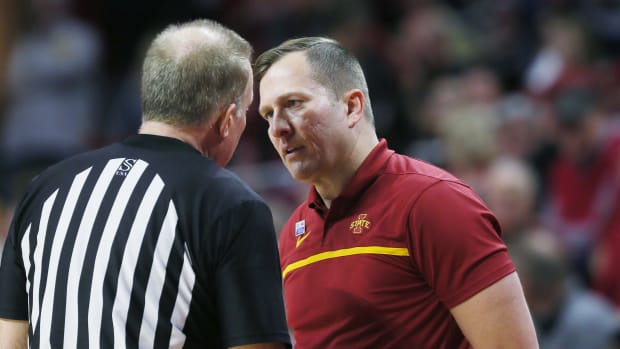 Iowa State Cyclones men's basketball head coach T. J. Otzelberger talks to an official during the second half against Kansas State Wildcats in the Big-12 conference showdown of an NCAA college basketball at Hilton Coliseum on Wednesday, Jan. 24, 2024, in Ames, Iowa.  