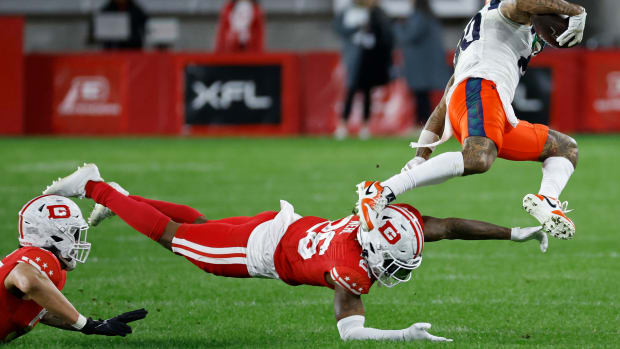 Feb 19, 2023; Washington, DC, USA; Seattle Sea Dragons wide receiver Blake Jackson (80) is tackled by D.C. Defenders cornerback DeJuan Neal (26) during the fourth quarter at Audi Field. Mandatory Credit: Geoff Burke-USA TODAY Sports  