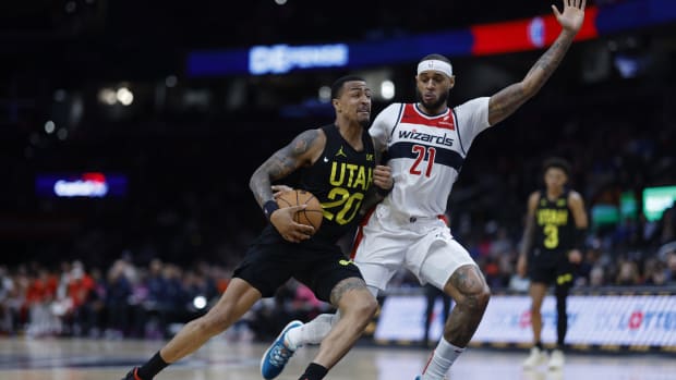 Jan 25, 2024; Washington, District of Columbia, USA;Utah Jazz forward John Collins (20) drives to the basket as Washington Wizards center Daniel Gafford (21) defends in the second half at Capital One Arena.