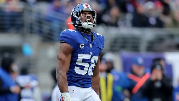 Dec 31, 2023; East Rutherford, New Jersey, USA; New York Giants linebacker Bobby Okereke (58) celebrates his sack against the Los Angeles Rams during the second quarter at MetLife Stadium.