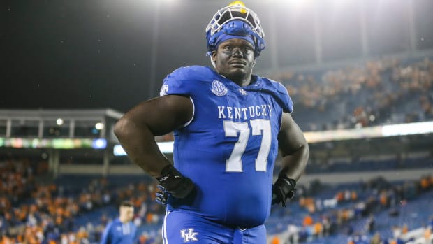 Kentucky Wildcats offensive lineman Jeremy Flax (77) looks up at the stands as he walks off the field after the Cats fall to Tennessee 33-27 Saturday night in Lexington. Kentucky is now 5-3 for the season. Oct. 28, 2023.