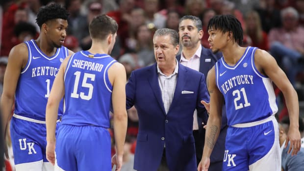 Jan 27, 2024; Fayetteville, Arkansas, USA; Kentucky Wildcats head coach John Calipari talks to his team during a timeout in the first half against the Arkansas Razorbacks at Bud Walton Arena. Mandatory Credit: Nelson Chenault-USA TODAY