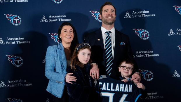 Tennessee Titans Head Coach Brian Callahan and his wife, Allyson, daughter Norah, 8, and Ronan, 6, take their turn in front of the cameras after Callahan's introductory press conference at Ascension Saint Thomas Sports Park.