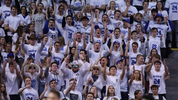 Jan 27, 2024; Provo, Utah, USA; Members of the Brigham Young Cougars student section cheer for their team against the Texas Longhorns during the first half at Marriott Center. Mandatory Credit: Rob Gray-USA TODAY Sports