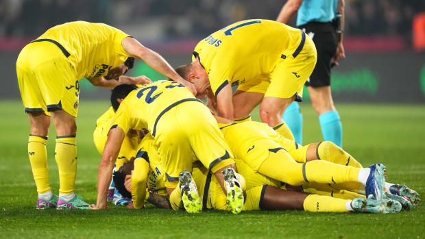 Villarreal's players pictured celebrating at the end of their 5-3 win at Barcelona in January 2024