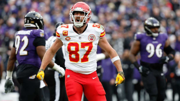 Travis Kelce celebrates after a play against the Ravens.