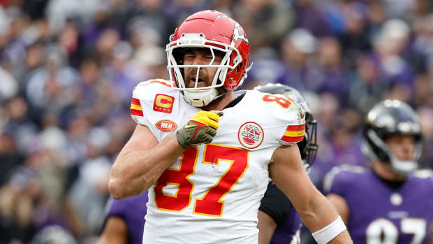 Chiefs tight end Travis Kelce (87) celebrates after scoring a touchdown against the Baltimore Ravens during the first half in the AFC Championship