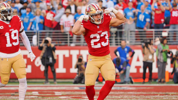 Jan 28, 2024; Santa Clara, California, USA; San Francisco 49ers running back Christian McCaffrey (23) celebrates after scoring a touchdown against the Detroit Lions during the first half of the NFC Championship football game at Levi's Stadium. Mandatory Credit: Kelley L Cox-USA TODAY Sports 