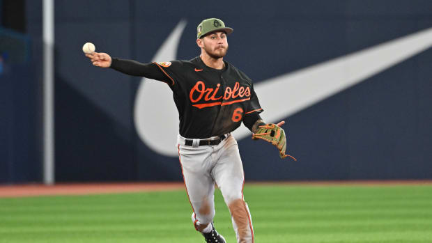 May 19, 2023; Toronto, Ontario, CAN; Baltimore Orioles third baseman Joey Ortiz (65) throws out Toronto Blue Jays right fielder George Springer (not shown) in the fifth inning at Rogers Centre. Mandatory Credit: Dan Hamilton-USA TODAY Sports