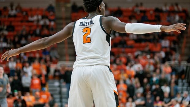 Jan 27, 2024; Stillwater, Oklahoma, USA; Oklahoma State Cowboys forward Eric Dailey Jr. (2) reacts on the court during the second half against the West Virginia Mountaineers at Gallagher-Iba Arena. Mandatory Credit: William Purnell-USA TODAY Sports  