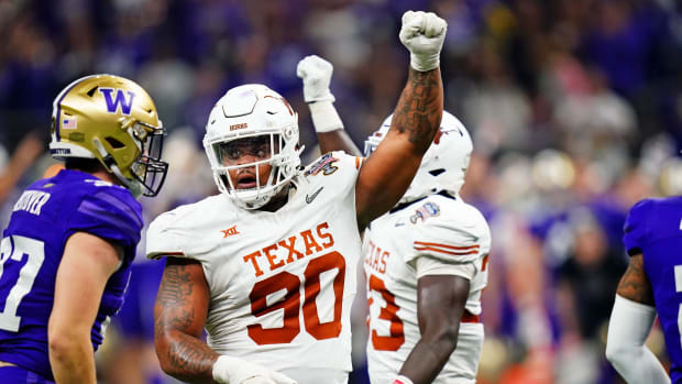 Jan 1, 2024; New Orleans, LA, USA; Texas Longhorns defensive lineman Byron Murphy II (90) celebrates after a play during the second quarter in the 2024 Sugar Bowl college football playoff semifinal game at Caesars Superdome.