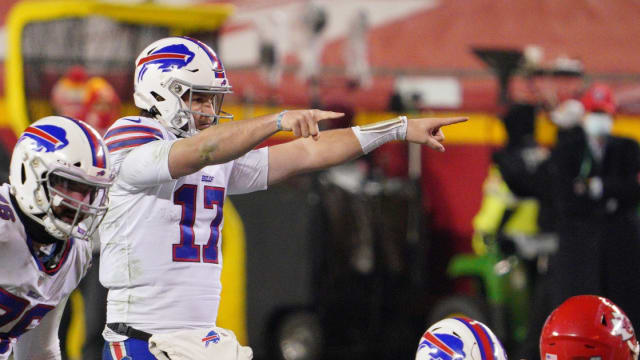 Bills quarterback Josh Allen (17) gestures on the line of scrimmage in the AFC Championship Game against the Kansas City Chiefs at Arrowhead Stadium.