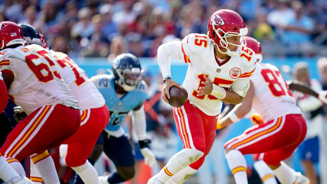 Kansas City Chiefs quarterback Patrick Mahomes (15) scrambles out of the pocket against the Titans during the third quarter at Nissan Stadium Sunday, Oct. 24, 2021 in Nashville, Tenn.