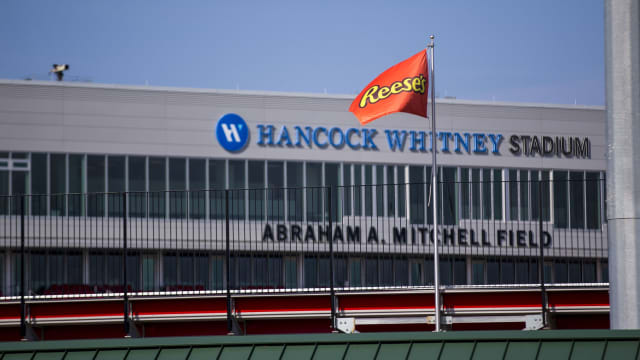 Jan 26, 2021; Mobile, Alabama, USA; Reese s flags fly above Hancock Whitney Stadium for Senior Bowl week. The first day s practices were moved indoors with no media access due to weather concerns.