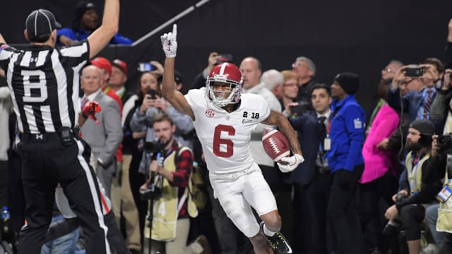 Alabama Crimson Tide wide receiver DeVonta Smith (6) celebrates his game-winning touchdown in overtime against the Georgia Bulldogs in the 2018 CFP national championship college football game