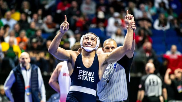 Penn State's Aaron Brooks reacts after winning in the semifinals of the 2023 NCAA Wrestling Championships.