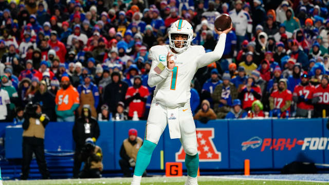 Dec 17, 2022; Orchard Park, New York, USA; Miami Dolphins quarterback Tua Tagovailoa (1) throws the ball against the Buffalo Bills during the second half at Highmark Stadium.