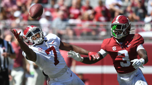 Apr 22, 2023; Tuscaloosa, AL, USA; White team wide receiver Ja'Corey Brooks (7) reaches out for a pass as he is defended by Crimson team defensive back Terrion Arnold (3) at Bryant-Denny Stadium. Mandatory Credit: Gary Cosby-USA TODAY Sports