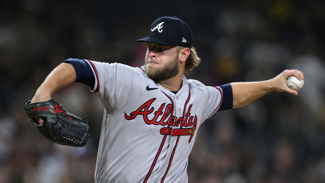 Apr 17, 2023; San Diego, California, USA; Atlanta Braves relief pitcher A.J. Minter (33) throws a pitch against the San Diego Padres during the ninth inning at Petco Park. Mandatory Credit: Orlando Ramirez-USA TODAY Sports