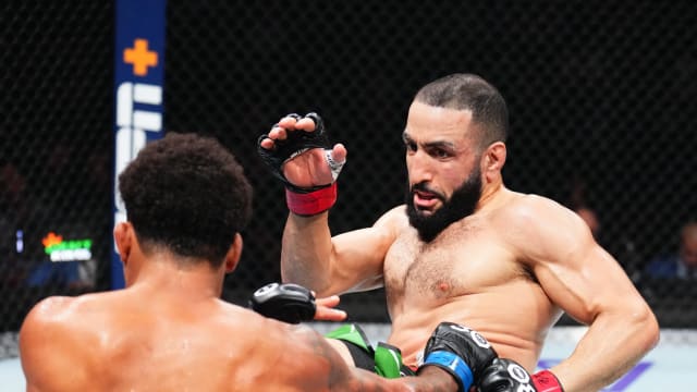 Belal Muhammad lands a body kick on Gilbert Burns at UFC 288