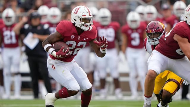 Sep 10, 2022; Stanford, California, USA; Stanford Cardinal running back E.J. Smith (22) runs with the football during the first quarter against the USC Trojans at Stanford Stadium. Mandatory Credit: Stan Szeto-USA TODAY Sports