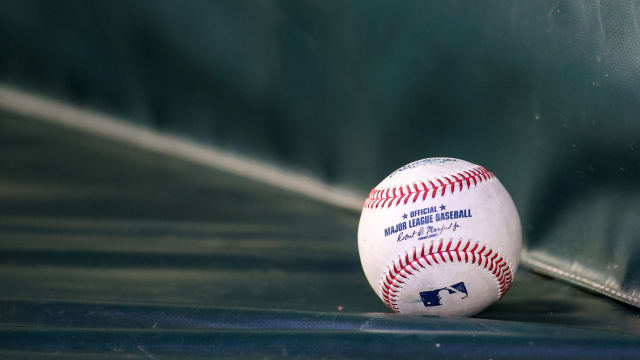 May 20, 2023; Atlanta, Georgia, USA; A detailed view of a Major League Baseball during a game between the Seattle Mariners and Atlanta Braves in the third inning at Truist Park.