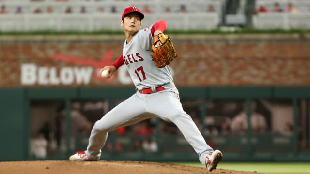 Jul 22, 2022; Atlanta, Georgia, USA; Los Angeles Angels starting pitcher Shohei Ohtani (17) throws against the Atlanta Braves in the second inning at Truist Park.