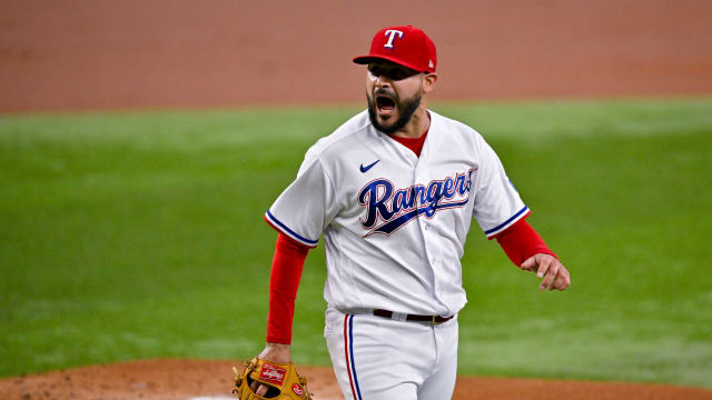 Texas Rangers starting pitcher Martin Perez walks off the field after the first inning of a July 3 game against the Houston Astros at Globe Life Field.