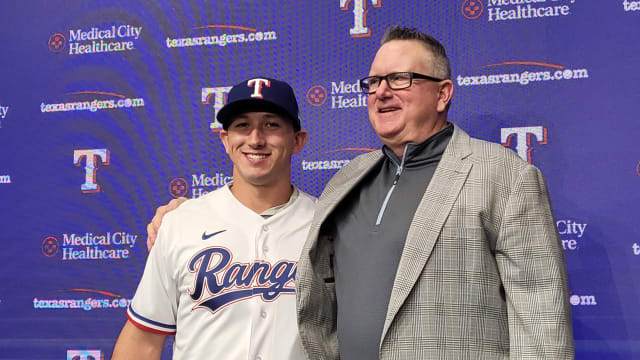The Texas Rangers top draft pick Wyatt Langford, left, with the club's senior director of amatuer scouring Kip Fagg, was introduced during a Tuesday press conference at Globe Life Field.