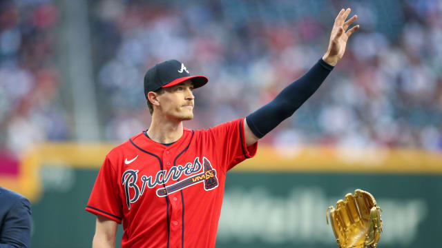 Apr 7, 2023; Atlanta, Georgia, USA; Atlanta Braves starting pitcher Max Fried (54) receives a gold glove before a game against the San Diego Padres at Truist Park.