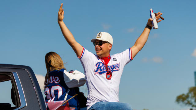 Texas Rangers first baseman Nathaniel Lowe acknowledges the fans during the World Series championship parade on Nov. 3 at Globe Life Field.