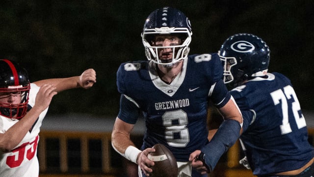 Greenwood's Kane Archer looks to pass in October