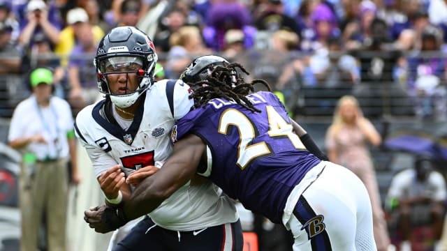 Houston Texans quarterback C.J. Stroud (7) is pressured by Baltimore Ravens linebacker Jadeveon Clowney (24) during the second half at M&T Bank Stadium.