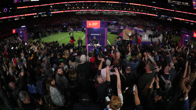 Feb 5, 2024; Las Vegas, NV, USA; A general view as Kansas City Chiefs tight end Travis Kelce (87) is interviewed by media during Super Bowl LVIII Opening Night at Allegiant Stadium. Mandatory Credit: Kirby Lee-USA TODAY Sports  