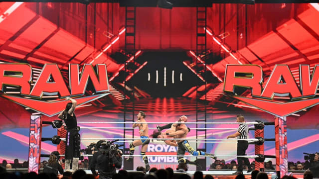A crowd shot of the WWE Raw arena during a live episode broadcast on USA Network.